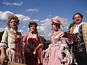 [People wearing baroque historic costumes at the Ludwigsburg Residential Palace]